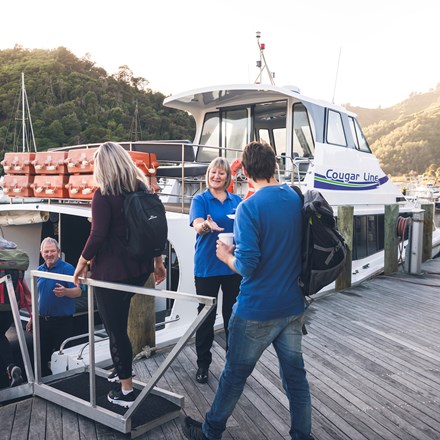 Passengers board their Cougar Line boat in Picton Marina.